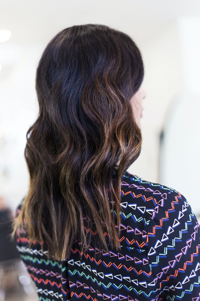 Woman with long, brunette hair